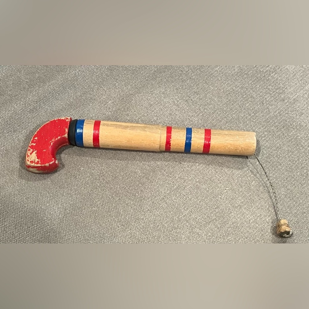 Vintage wooden novelty pop gun toy